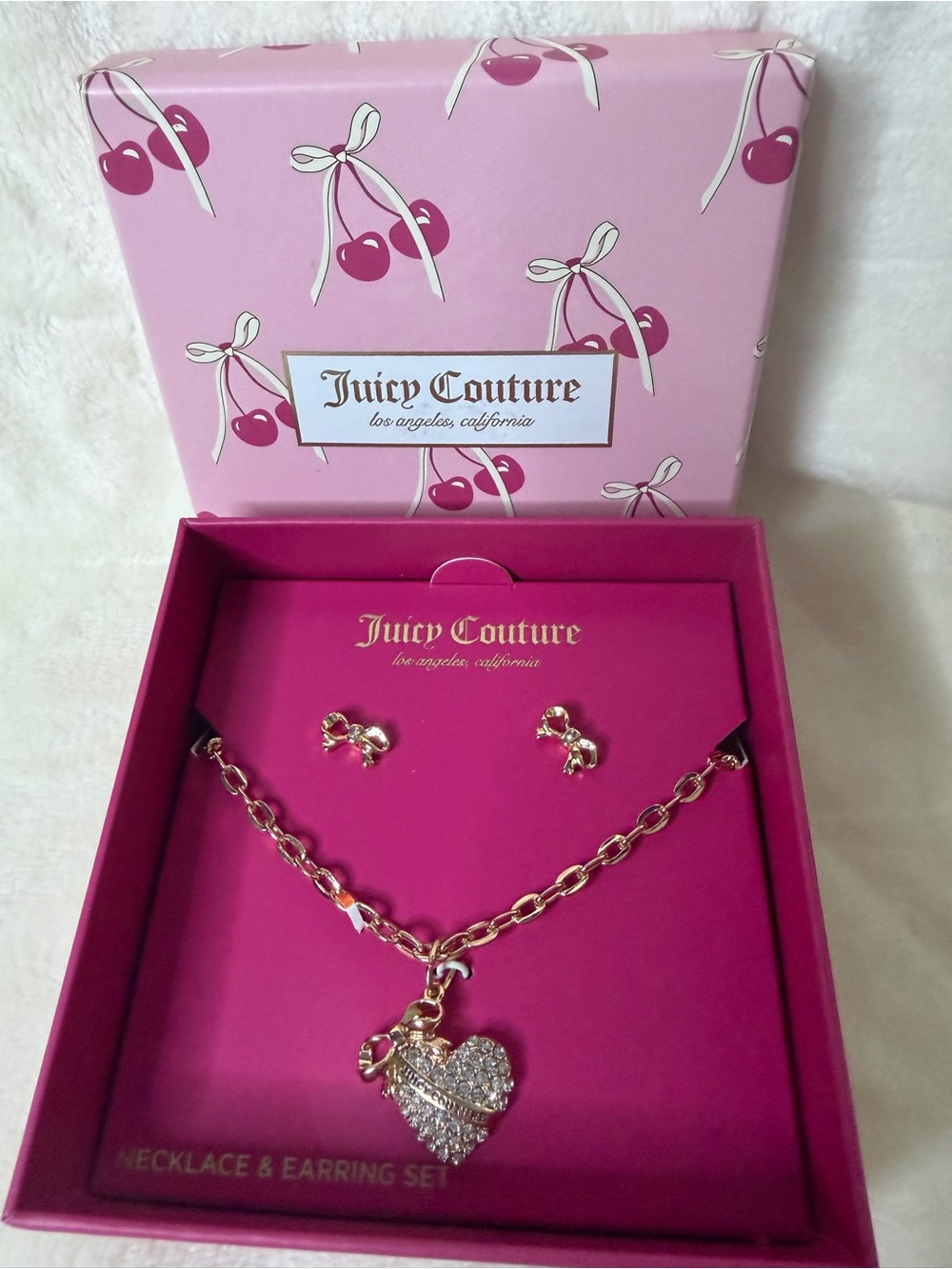 Juicy Couture gold-tone necklace and stud earring set